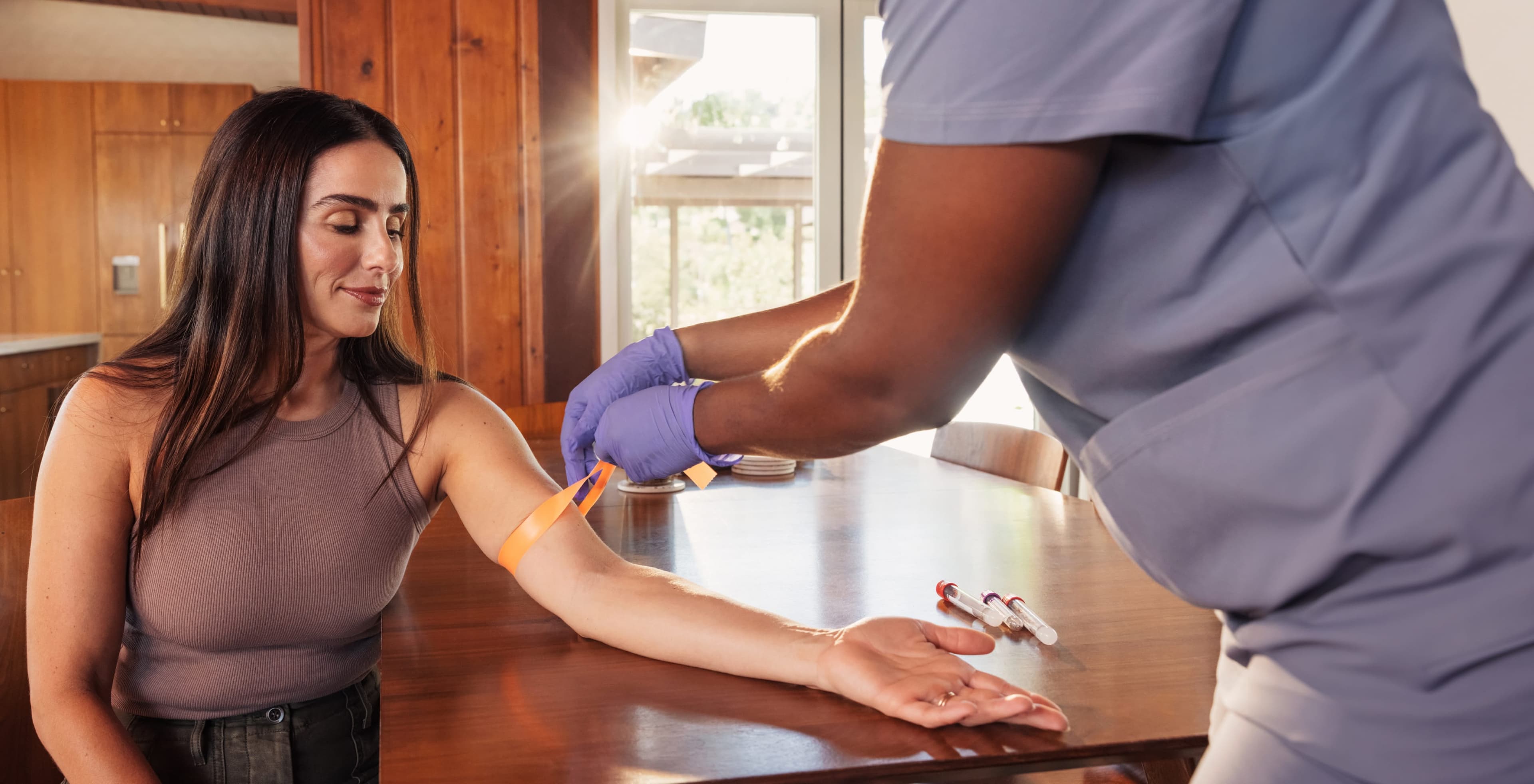 pause membership woman getting blood drawn